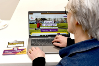 Image of person on a laptop on the Live Well website