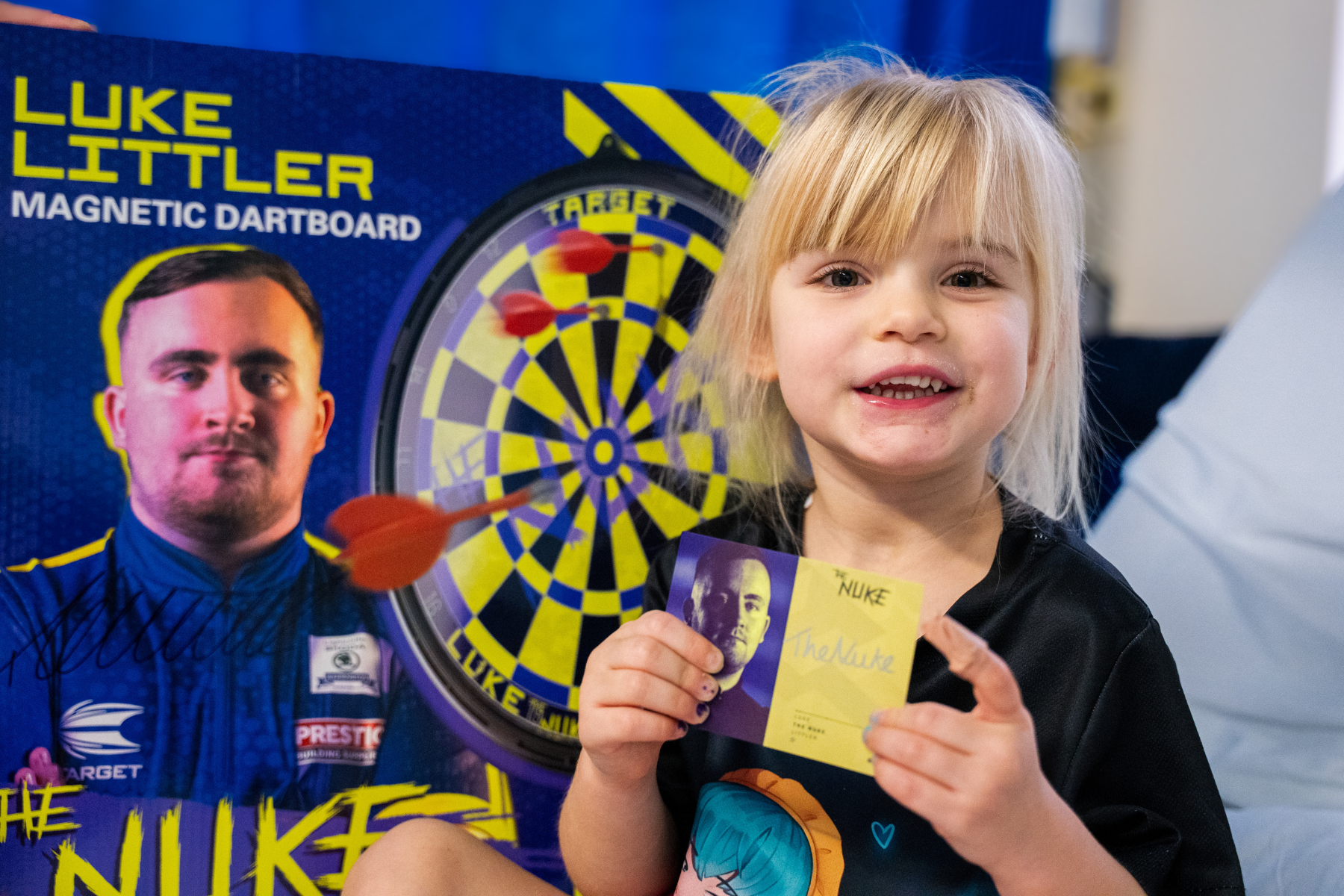 Mollie-Mae, aged 4, with her gifts from Luke Littler