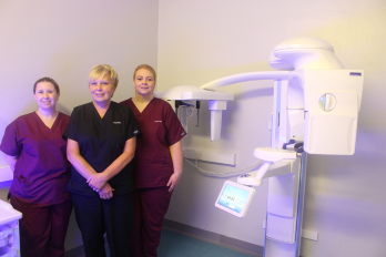 Staff with the cone beam scanner